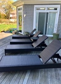 Four outdoor wicker lounge chairs & cushions 