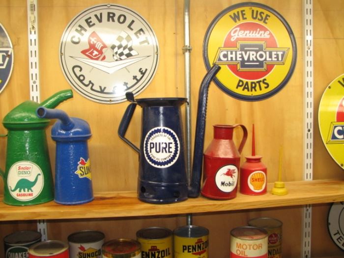 Vintage oil cans and advertising signs