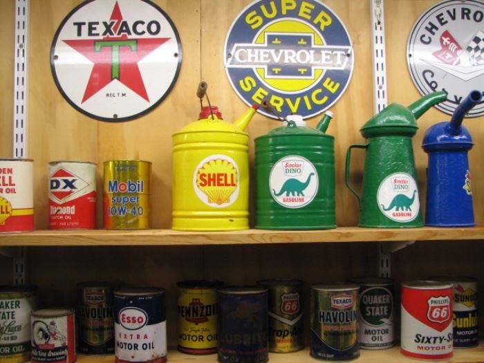 Vintage oil cans, advertising and petroleum signs