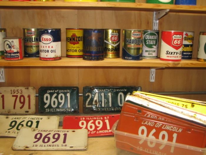 Vintage oil cans and license plates