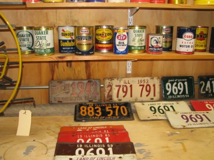 Vintage oil cans and license plates