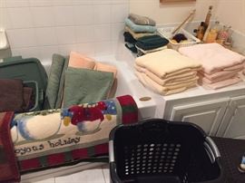 Bathroom linens, towels, rugs, laundry baskets