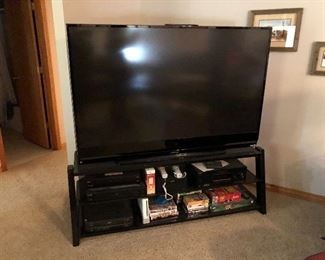 Who needs a HUGE tv? This thing will make you the party place during the big game!