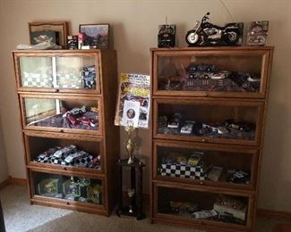 2 gorgeous display cabinets showcase an extensive car collection!!