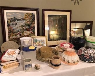 Cookbooks, pottery, more artwork and vintage lampshades