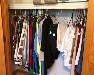 Closets full of men’s and women’s clothing 