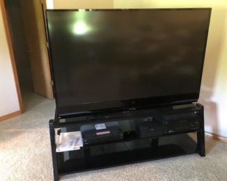 Check out this big screen tv!! This entire entertainment center is available!