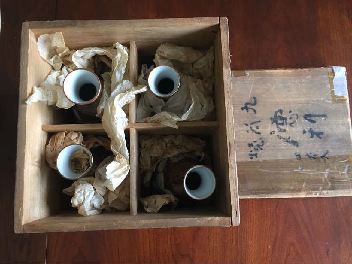 Very old Sake set in original wooden box. Purchased in Japan in the 1950's.