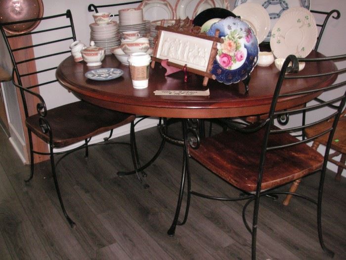 Wrought iron & wood dining table & 4 chairs