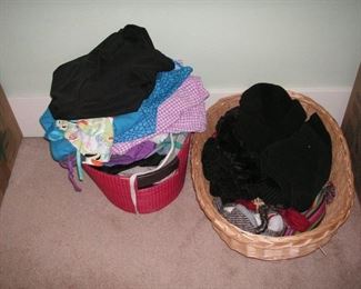 Bucket of shorts and basket of hats