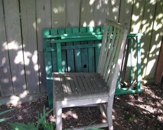 Folding green table and a weathered chair