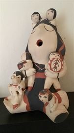 Signed Native American storytellers pottery 