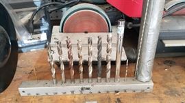 Set of drill bits sized for golf clubs.
