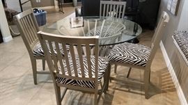glass kitchen table and zebra print 4 chairs