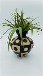 artificial plant and vase