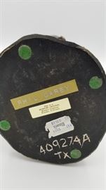 Bottom of cowboy "Vigilante" figurine