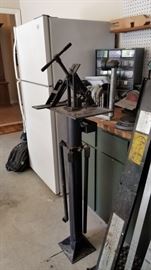 The homeowner used to own a golf shop and is selling off tools for making custom golf clubs- this big guy is a Mitchell loft and lie machine mounted on a base with accessories.