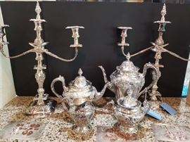 Silver plate candelabras and tea set.