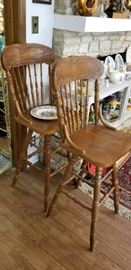2 swivel bar stools seats 30" high
Back of chair 47" high