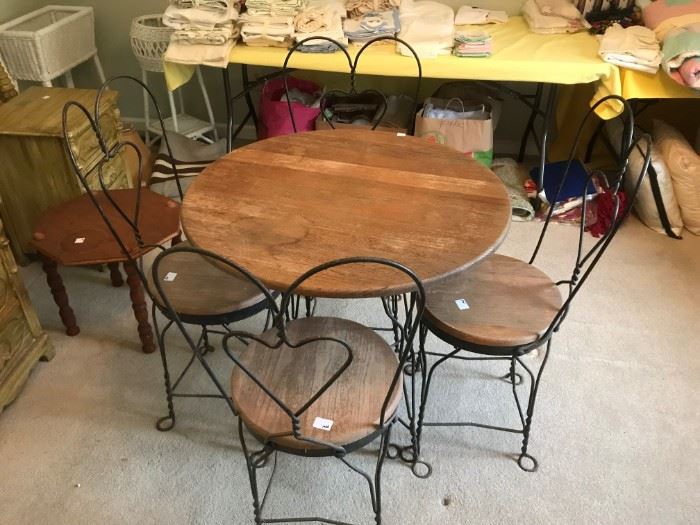 #87 Wood/Iron Ice Cream Table w/4 chairs 30round x29T $175.00
