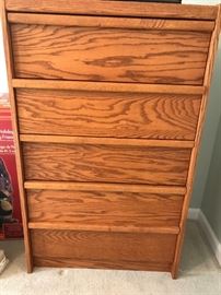 #100 5 drawer oak chest of drawers 30x16x48 $75.00
