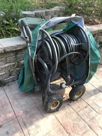 #115 hose real on wheels $65.00
