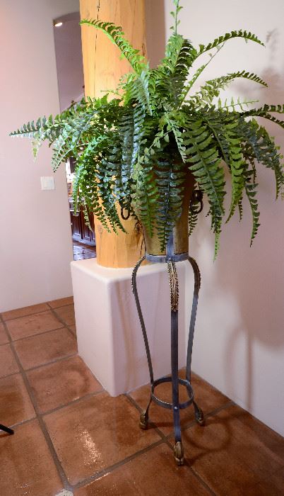 2 matching faux ferns and stands available. Very realistic looking.