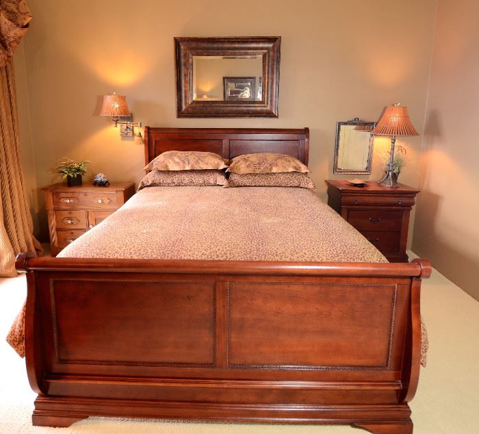 Another bed for sale. Beautiful wood bed with side tables and lamps and mirror.