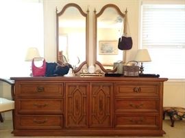 Vintage wooden dresser, w/pair of matching wall mirrors, by Basic-Witz Furniture Co., Waynesboro, VA. Basic-Witz Furniture was in business in Waynesboro from 1889 into the mid 1970s, when it was bought by Stanley Furniture, another company based in Virginia.