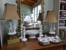Pair of vintage porcelain bisque table lamps, with shades and finials.