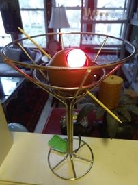 Well, well, when's the last time you same a stainless steel martooni glass, with an olive that lights up? Huh? I thought so. Clap on!