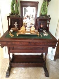 This desk has two drawers on each side.