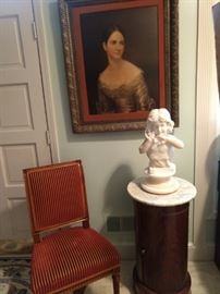 One of a pair of nicely upholstered French walnut side chairs, antique single door drum table with white marble top and antique carved marble bust of girl on swivel stand.