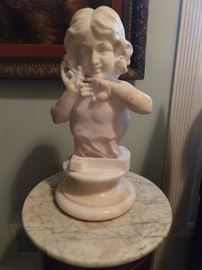 Aww, precious! Hand carved white marble bust, with matching swivel stand.
