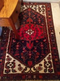Hand woven Persian Mahal, measures 4' x 6'.