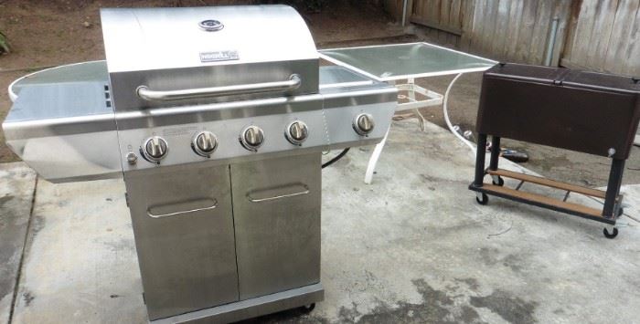 Nexgrill in hardly used condition. Rolling cooler.