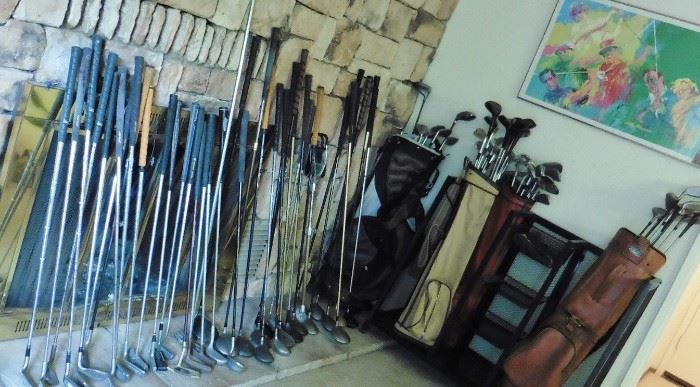 Huge amount of golf clubs, balls, rack, accessories