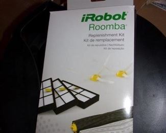 iRobot Roomba, like new, in box with additional filters.