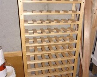 Wood wine rack, in four sections, stacked.
