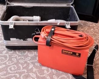 Vintage Hoover vacuum in carrying case.