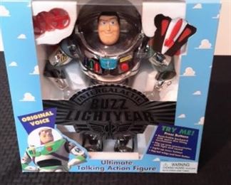 Toy Story's Buzz Lightyear Ultimate Talking Action Figures, new in box. Needs batteries.