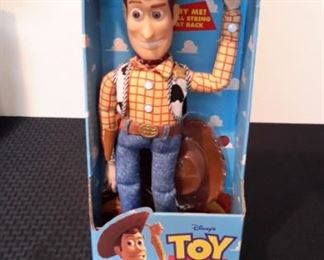 Toy Story's Pull-String Talking Woody, new in box. Works.