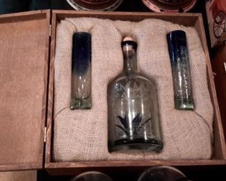 Empty, signed liquor bottles, some in boxed sets.
