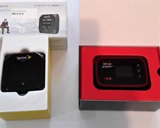 Sprint Mobile Hotspot and Verizon Jetpack, in box.
