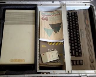 Vintage Macintosh Commodore 64! Comes with CPU, keyboard, mouse, two joysticks, manuals, chords and carrying case!