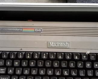Vintage Macintosh Commodore 64! Comes with CPU, keyboard, mouse, two joysticks, manuals, chords and carrying case!
