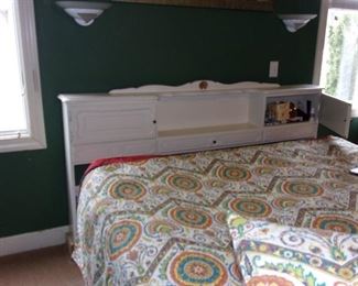 King sized headboard with storage (bed and linens not for sale.)