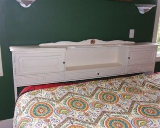 King sized headboard with storage (bed and linens not for sale.)