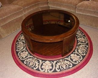 MCM round coffee table and pretty round rug.