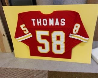 Unframed "Thomas" jersey.